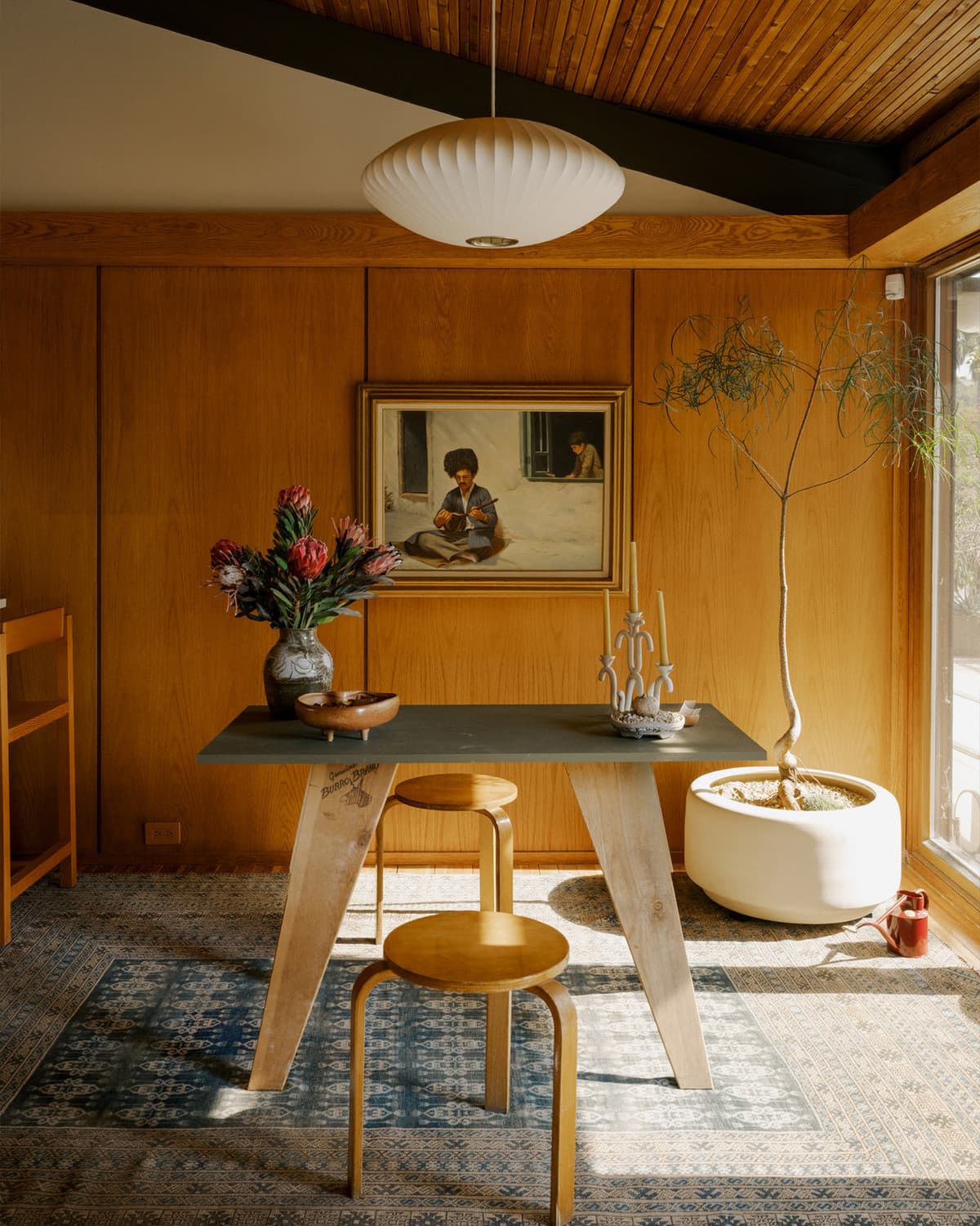 Elegant dining space with curated Aja Rugs selection